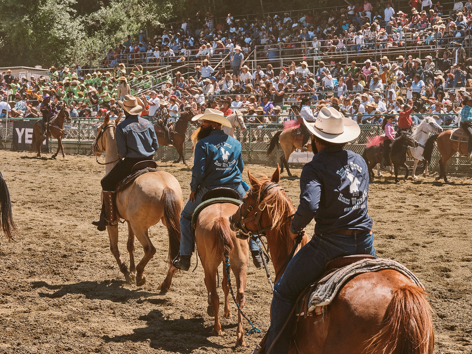 Riders in the rodeo arena