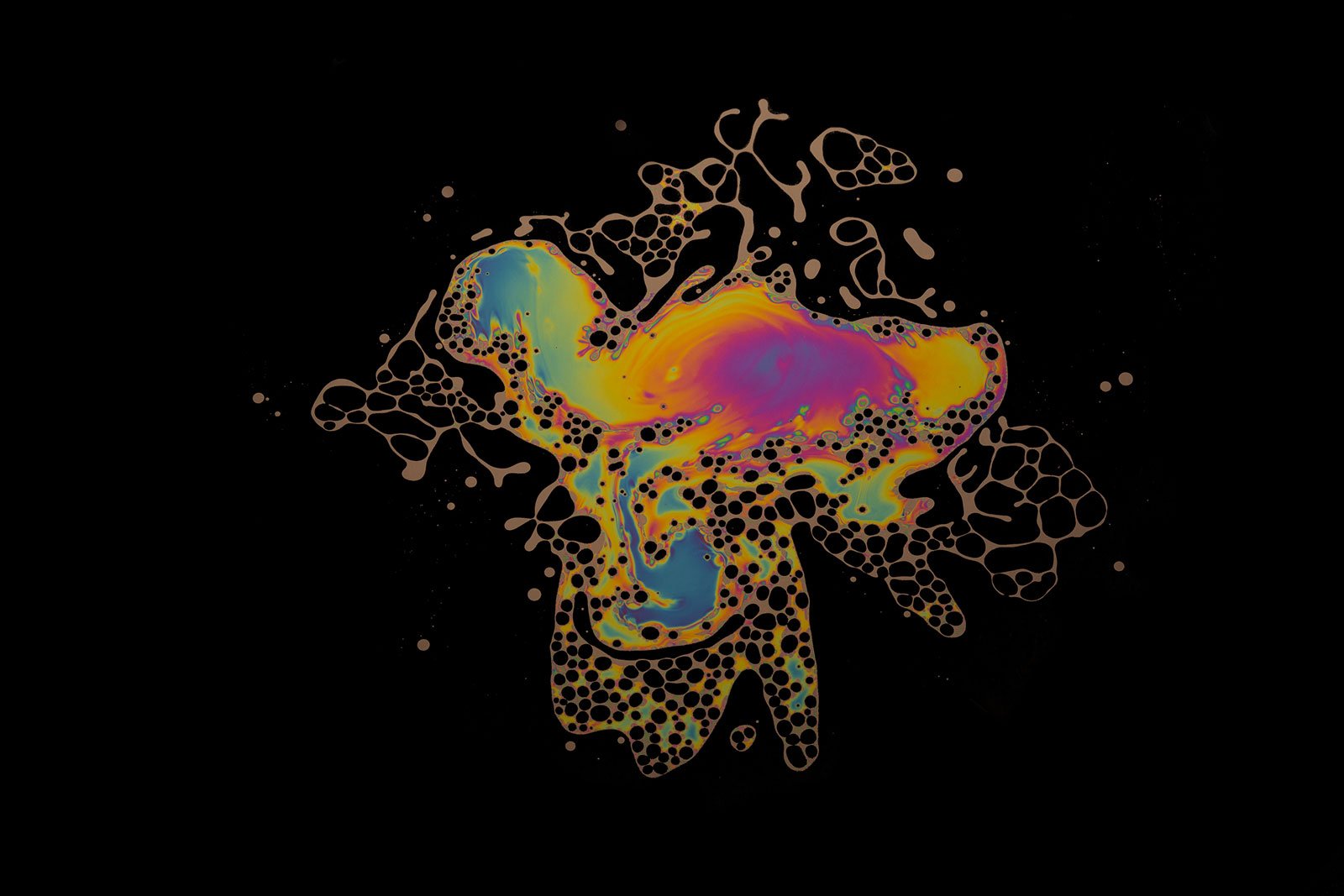 oil and water mixture, rainbow splatter, odd shaped and bright magenta and golden 