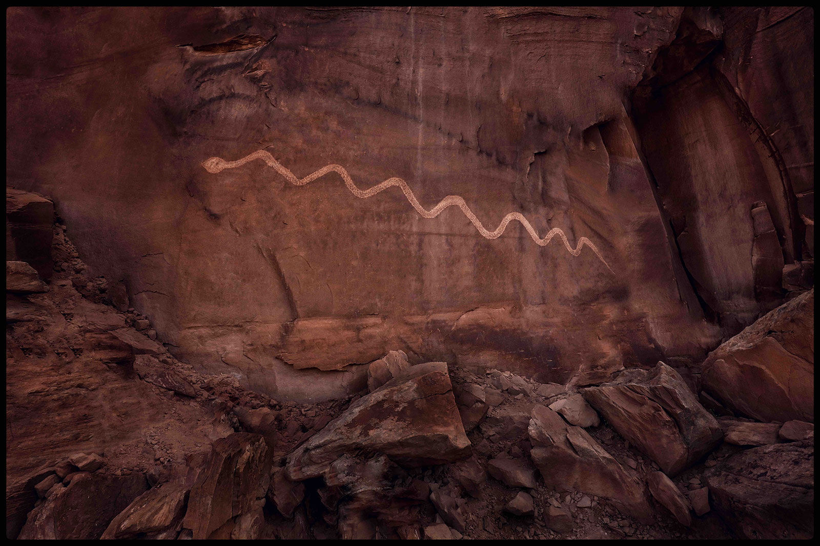 cave drawing on large clay like wall