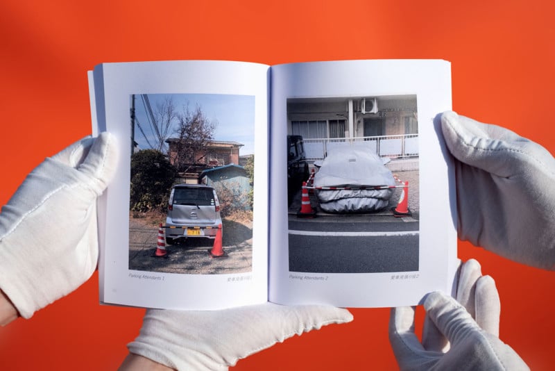 Traffic cone protecting a single car in from of a residence