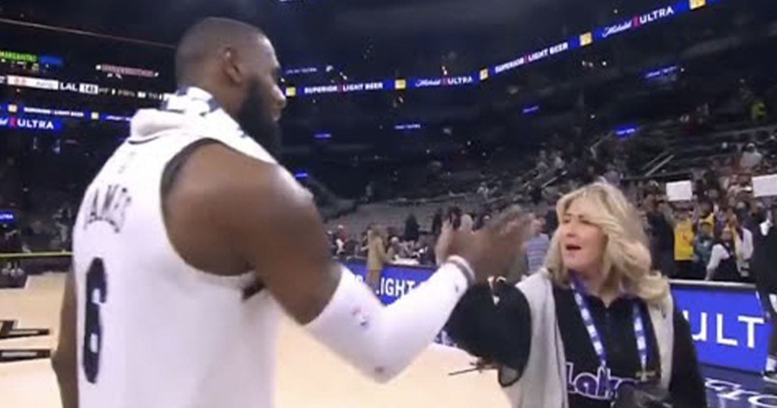LeBron James Has a Mystery Handshake With Los Angeles Lakers Photographer