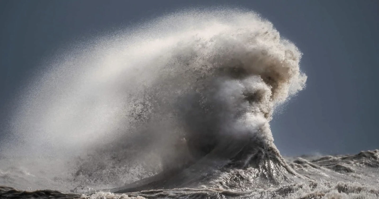 Photographer Captures ‘Face of Poseidon’ in Stormy Waves