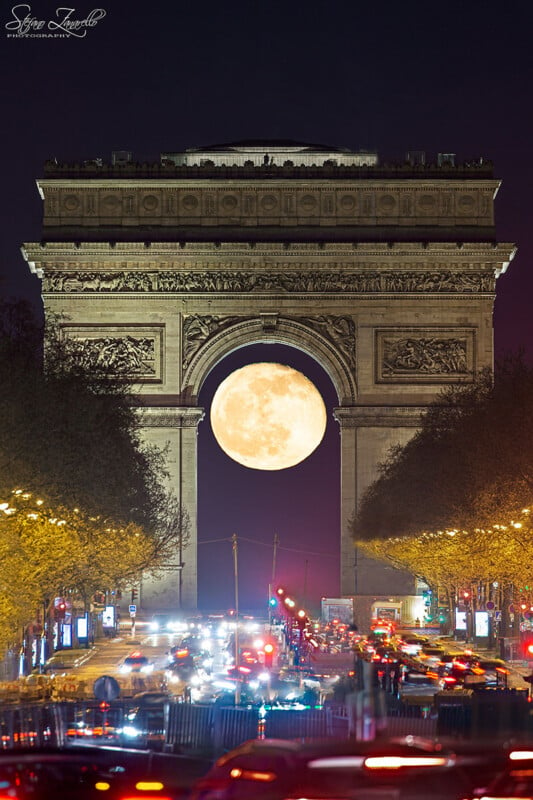 Arc De Triumph with a full moon