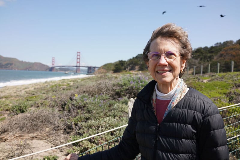 Woman standing in front of Golden Gate Bridge