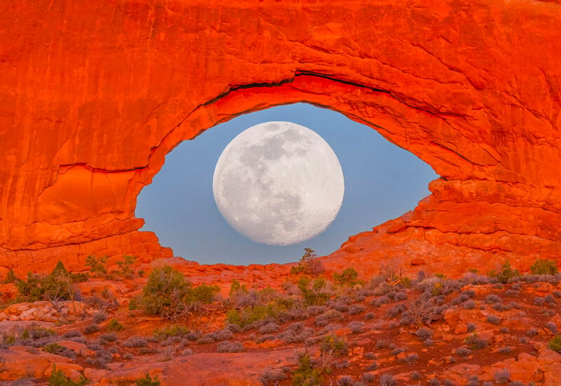 Image of Full Moon Through a Rock Formation Looks Like a Giant Eye