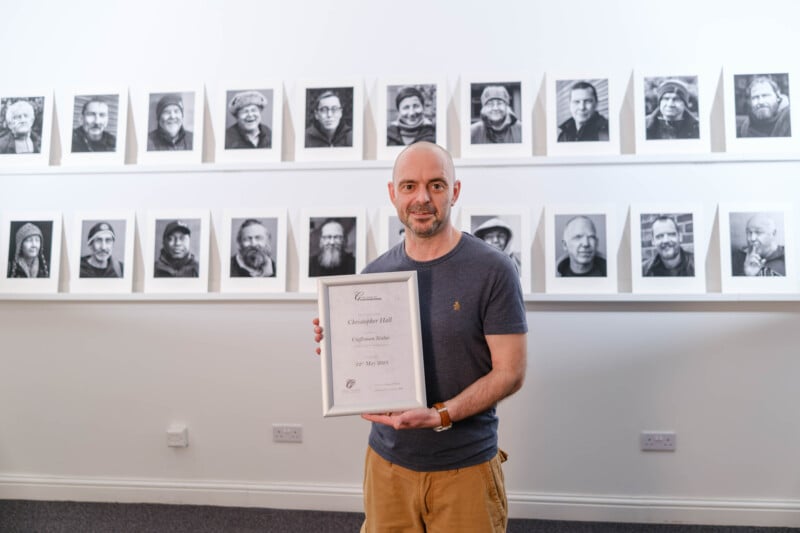 Christopher Hall with his certificate