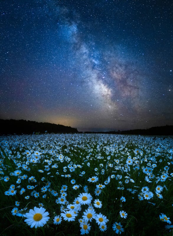 Skywatcher Beams at the Starry Night Sky in Stunning Cosmic Selfie