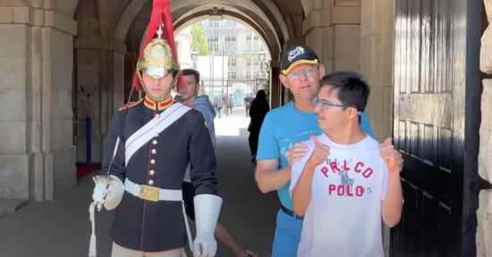 Kings guard poses for photo with boy with Down Syndrome