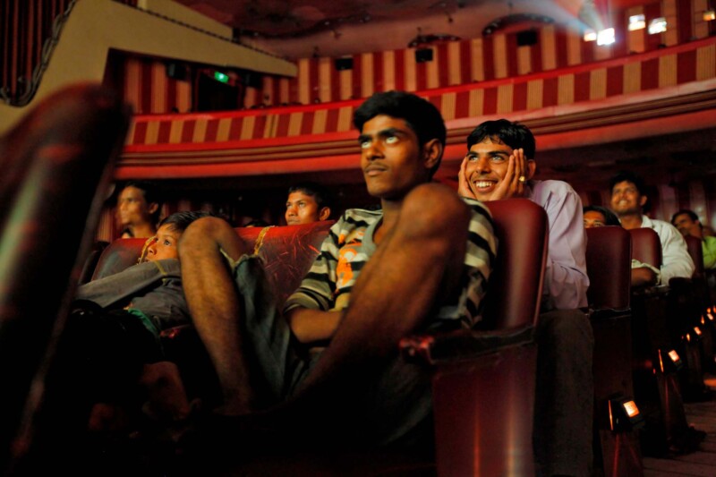 Cinema goers watch Bollywood movie
