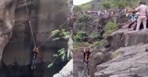 A tourist had to be dramatically rescued after falling into a 70-foot gorge while attempting to take a selfie.