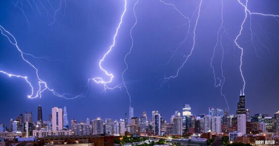 Three lightning strikes hitting Chicago