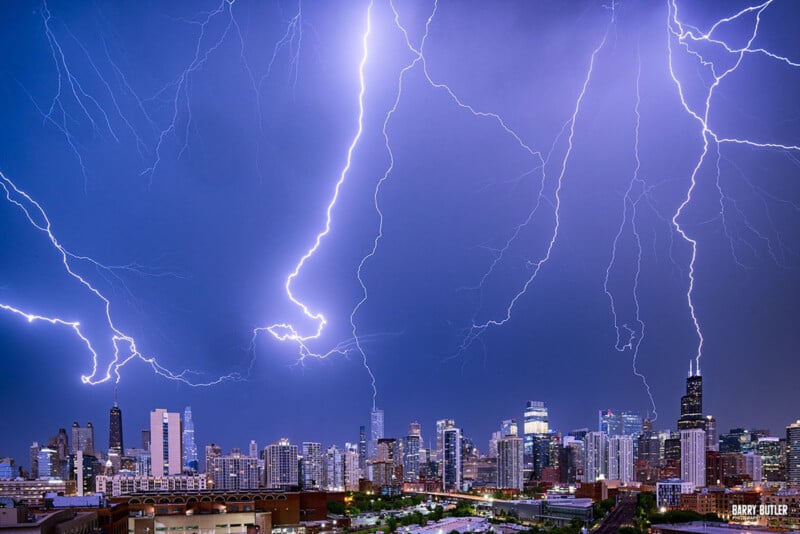 Three lightning strikes hitting Chicago
