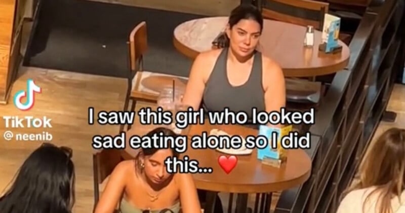 A popular TikToker has been criticized for filming a “sad” woman eating alone for a “random acts of kindness” video.