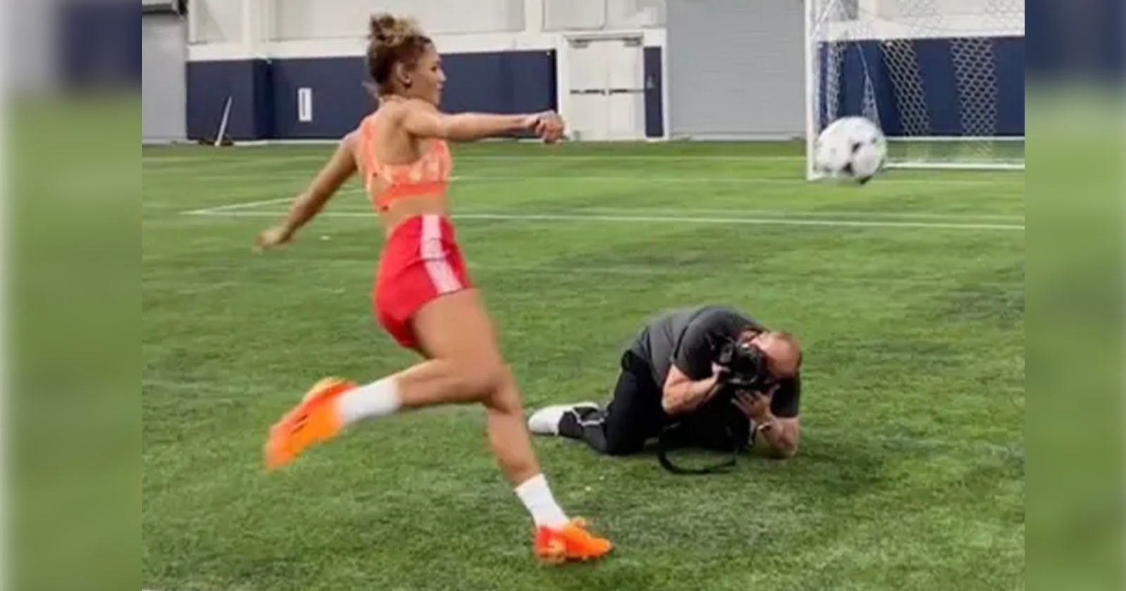 Photographer’s Lens Takes a Hit as Soccer Star Strikes Ball with Force