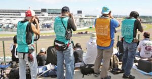 Amateur photographers shooting the Japanese Grand Prix