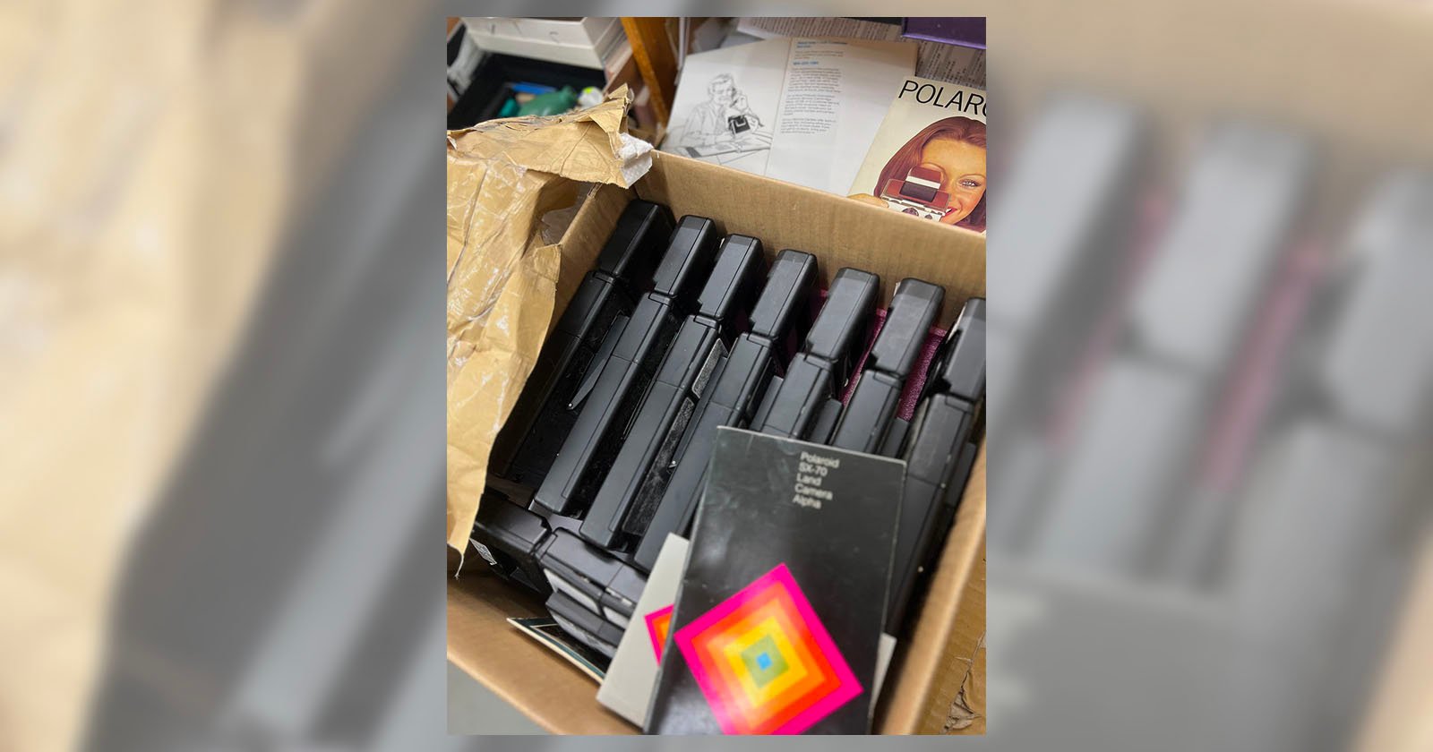 Box of Polaroid SLR 680 Cameras