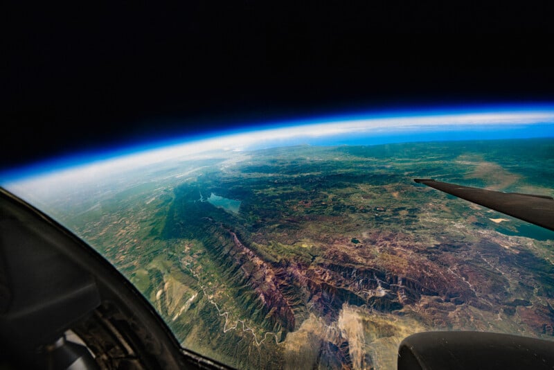The view from a U2 Dragon Lady spy plane photographed by Commercial Photographer Blair Bunting. The image is part of the series "Photoshoot at the Edge of Space," in which Bunting did a photoshoot above 70,000 feet while in a spacesuit.