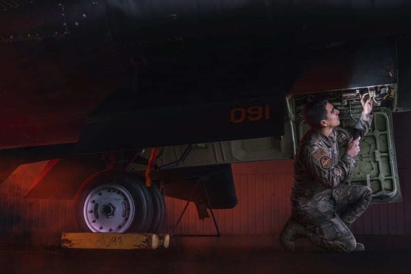 A U2 Dragon Lady spy plane maintainer photographed by Advertising Photographer Blair Bunting. The image is part of the series "Photoshoot at the Edge of Space," in which Bunting did a photoshoot above 70,000 feet while in a spacesuit.