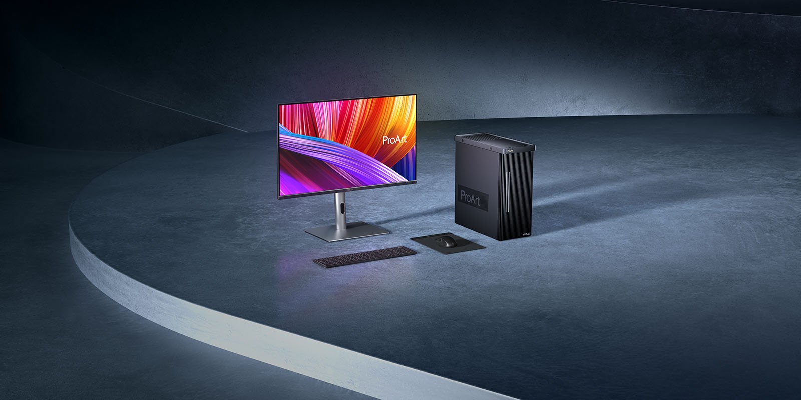 The Asus ProArt Station with a monitor, keyboard, and mouse.