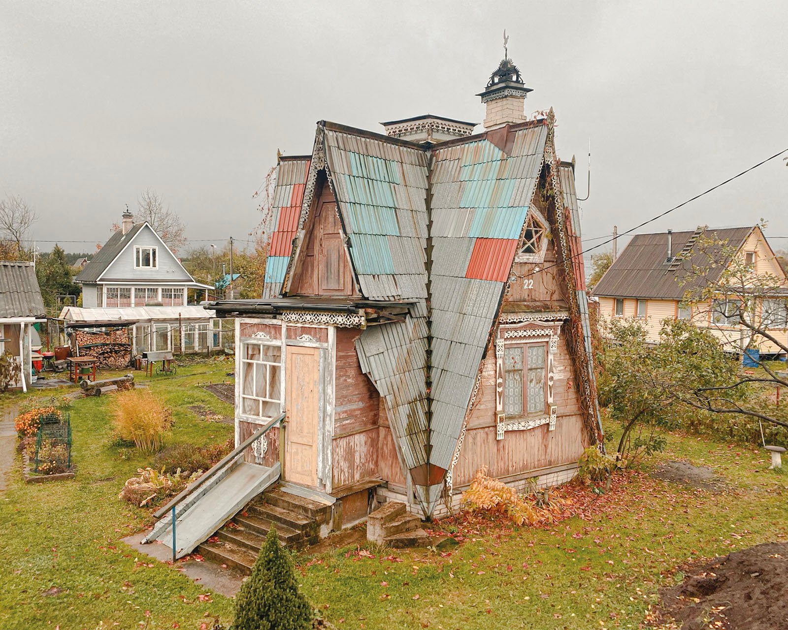 A dacha home with a high-pitched roof