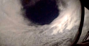 The eye of the Hurricane Lee is lit up by lightning.