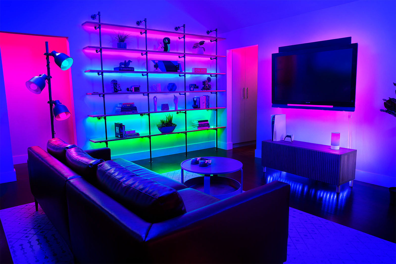 A living room in an ultraviolet glow produces by Razer's new smart lighting products.