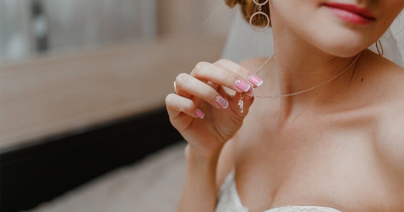 A wedding photographer has gone viral with her hack for making sure a bride’s necklace stays in place on the big day and does not ruin the photos.