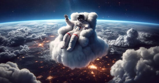 Astronaut floating on a cloud
