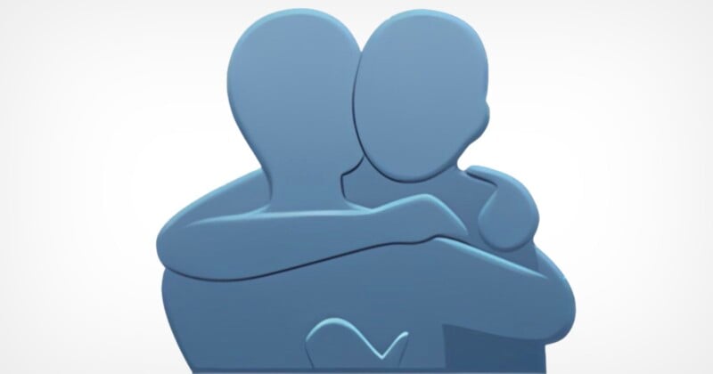 People are arguing over whether this WhatsApp emoji is meant to show two people hugging -- or a film camera.