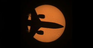Plane crossing the Sun.