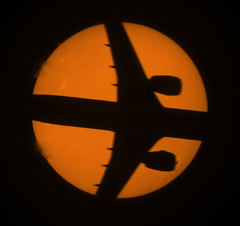 Plane crosses the Sun