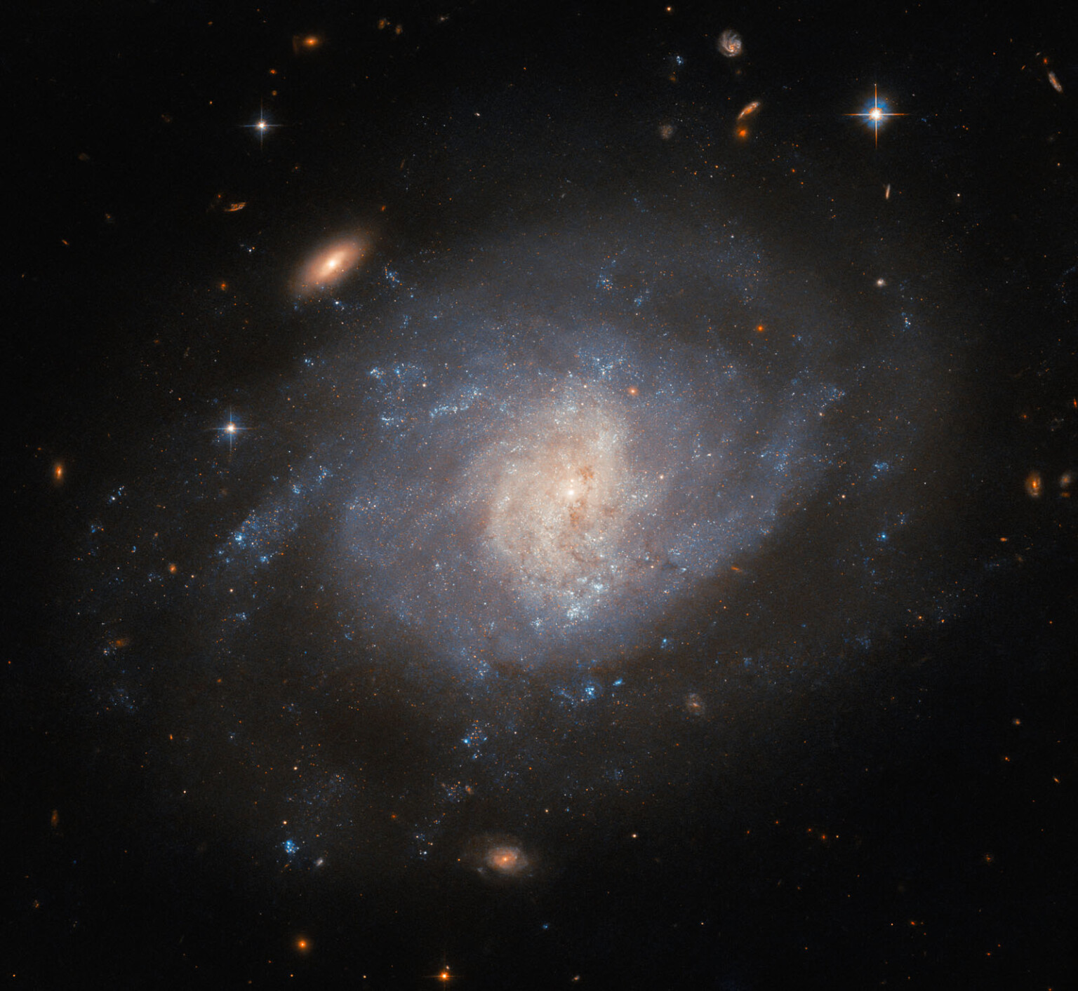 Hubble Looks at a Galaxy's Bombastic Origins and Shows the Power of ...