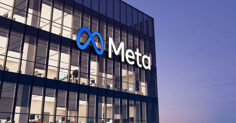 A building in the evening shows the Meta logo