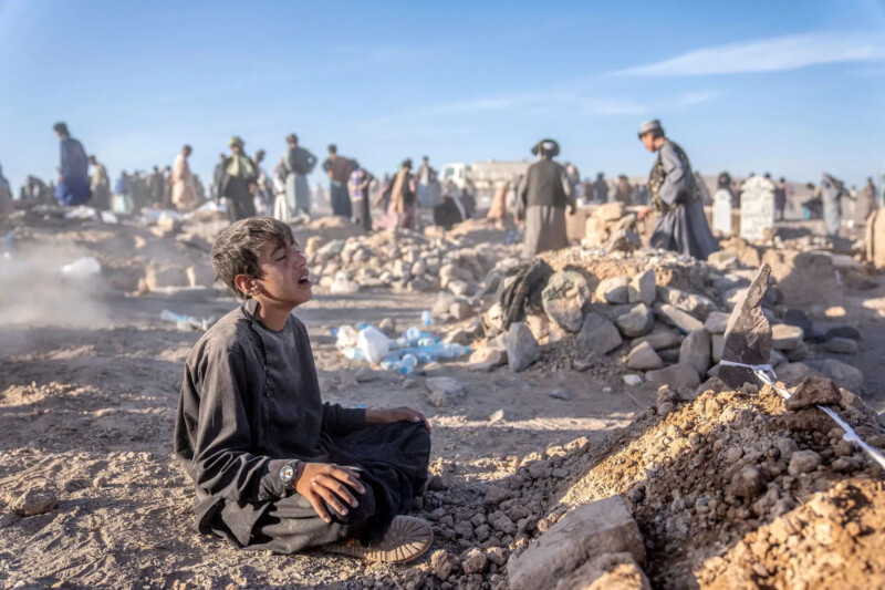 Afghan boy mourns his little brother