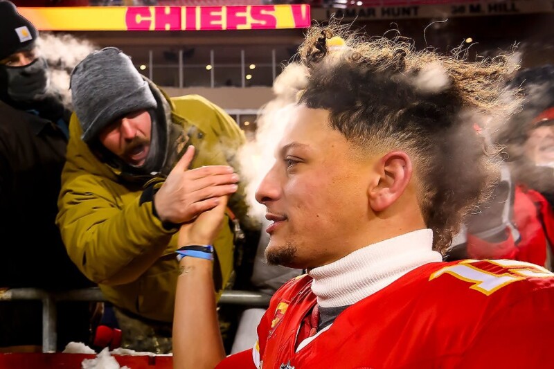 a photo of an nfl quarterback after a playoff game with steam rising from his head