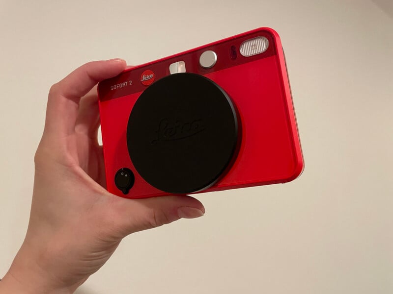 Leica Sofort 2 instant camera held up.