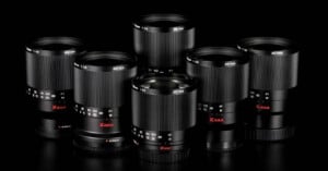 Six of the Kase 200mm f/5.6 lenses are placed against a black background.
