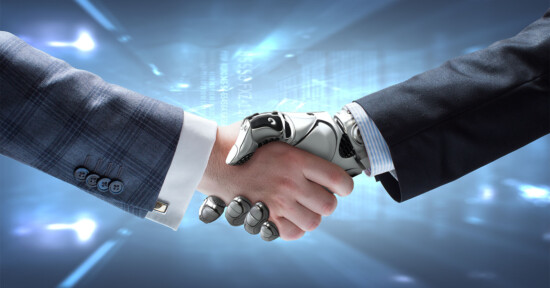 Businessman shaking hands with a robot. Artificial intelligence, business.