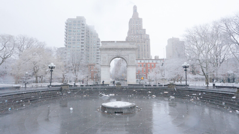 An empty Washington Square Park in the winter.