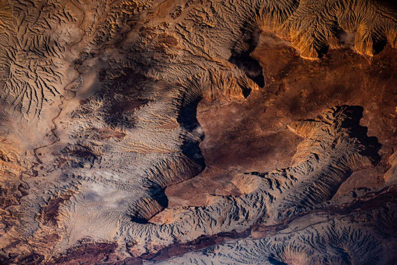 Graham Washatka aerial lansdcape photo, Utah landscape, blue and orange. Rocky landscape. 