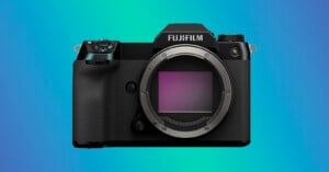 The Fujifilm GFX100S Medium Format Mirrorless Camera against a green blue gradient background.