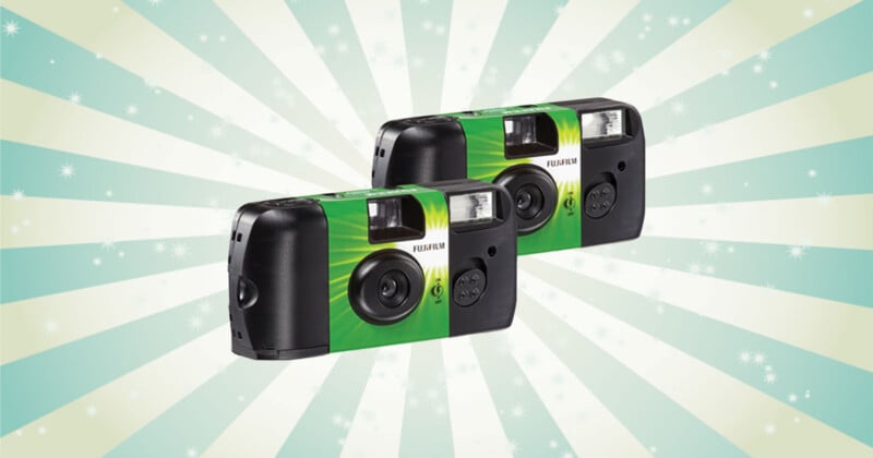 Fujifilm QuickSnap disposable cameras on retro background