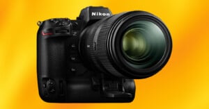 A Nikon Z9 mirrorless camera on a yellow background.