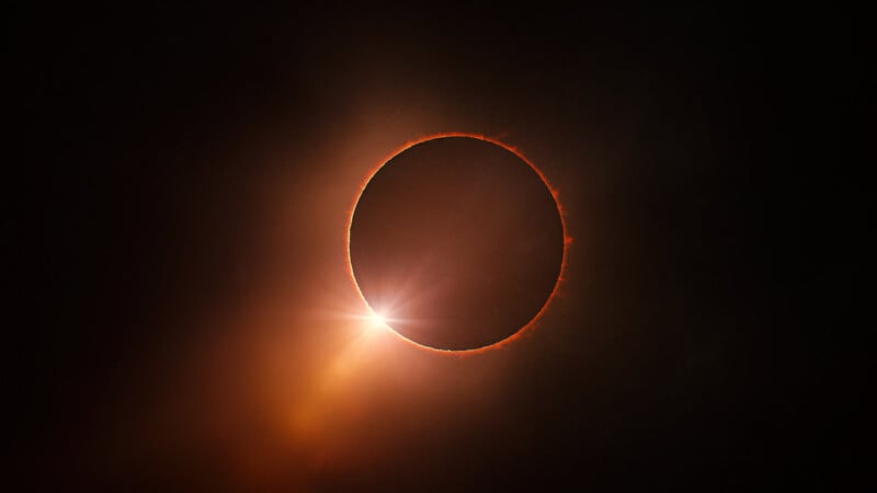 An image shows the diamond ring effect of a total solar eclipse. 