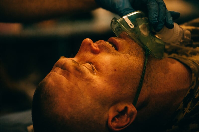 A man getting a face massage.