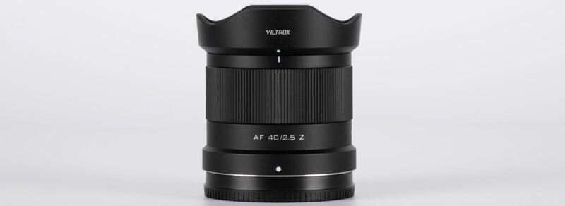 A black viltrox af 40/1.8 z lens with a petal-shaped lens hood, displayed against a plain white background. the lens is designed for z-mount cameras.