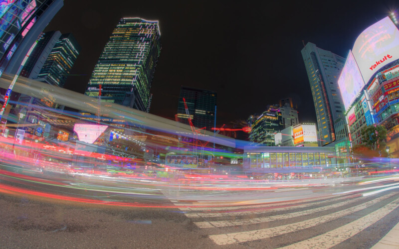 A long exposure image of a city street in Japan.
