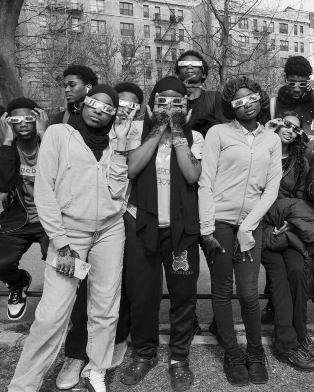 A portrait of students wearing protective eclipse glasses.
