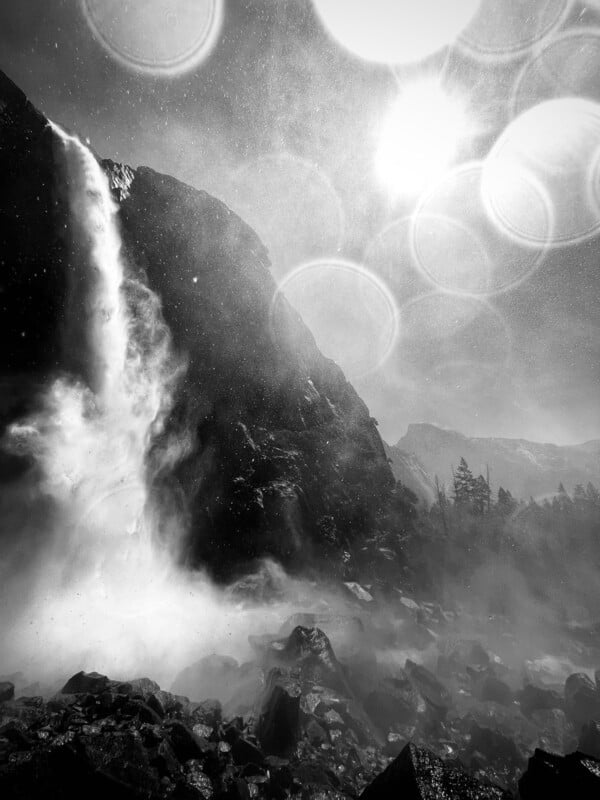A waterfall seen in black and white.