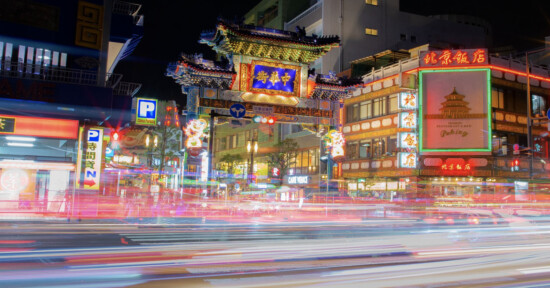 A long exposure image of a street in Japan.